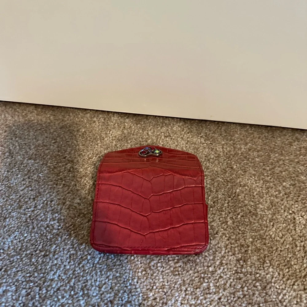 Red Jeweled Heart Closure Card Case (approx 3.75 in wide by 2 in height)